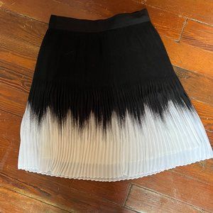 White and black pleated midi skirt